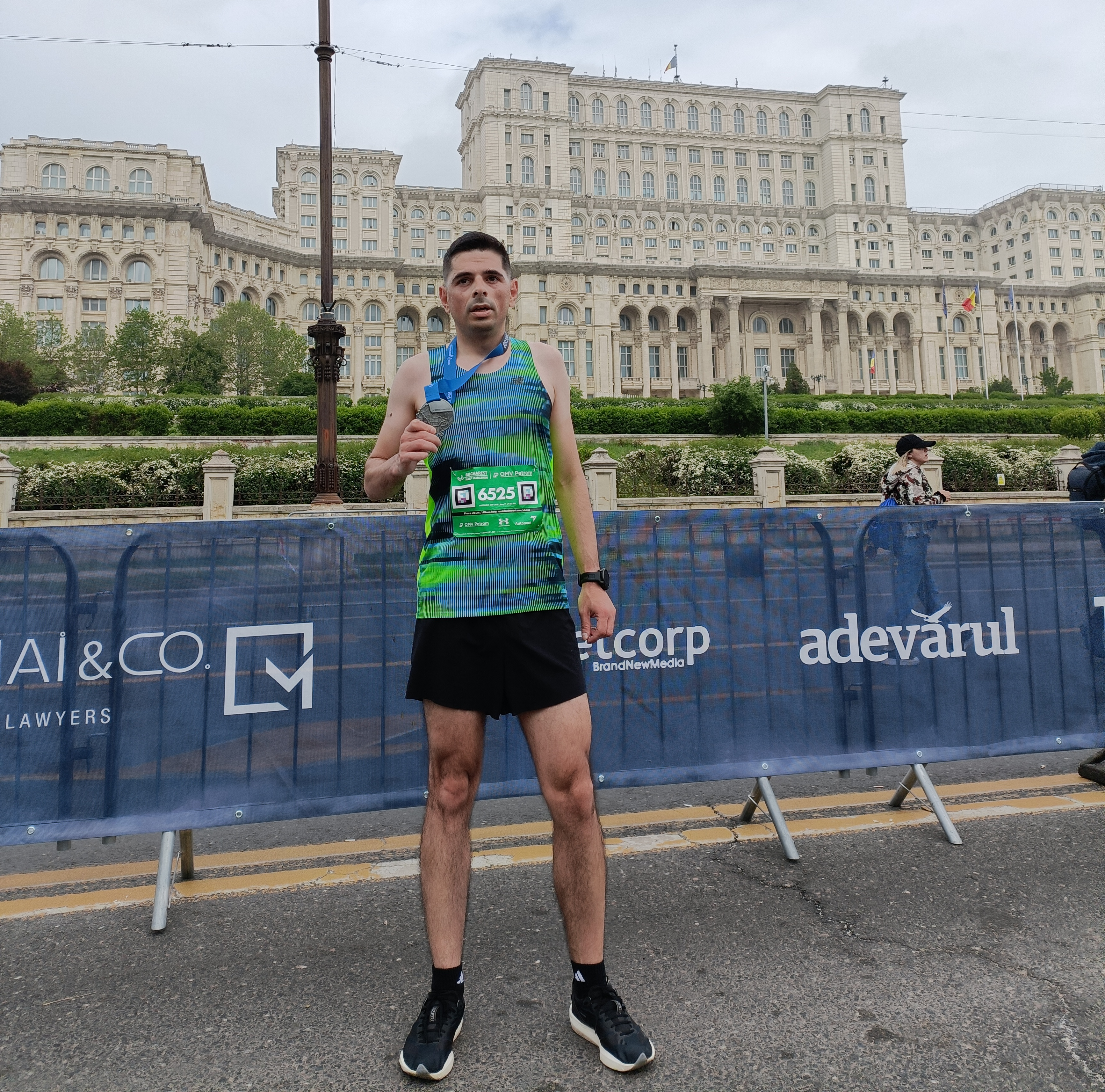 Radu crossing the finish line